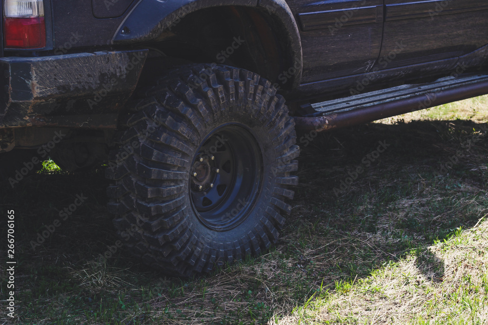 Wheels in the marsh. Offroad on Jeep in the Carpathian Mountains Wheels in the marsh. Offroad on Jeep in the Carpathian Mountains