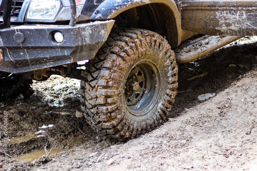 Wheels in the marsh. Offroad on Jeep in the Carpathian Mountains Wheels in the marsh. Offroad on Jeep in the Carpathian Mountains
