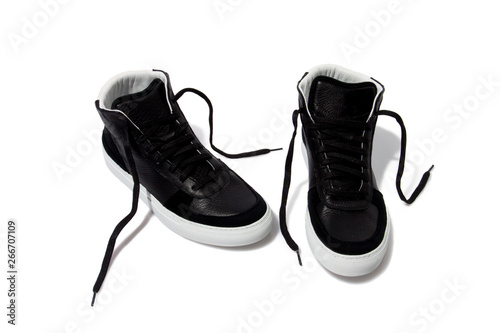 Black long sneakers isolated over white background