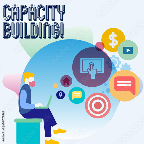 Word writing text Capacity Building. Business photo showcasing Strengthen the abilities of individuals Workforce planning Man Sitting Down with Laptop on his Lap and SEO Driver Icons on Blank Space