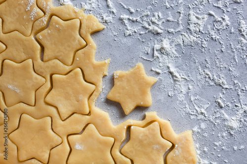 The process of baking cookies at home. Cookie dough. Star-shaped cookies, pryanik. view from above