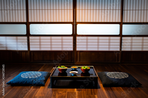 Fényképezés Traditional japanese machiya house or ryokan restaurant with black lacquered woo
