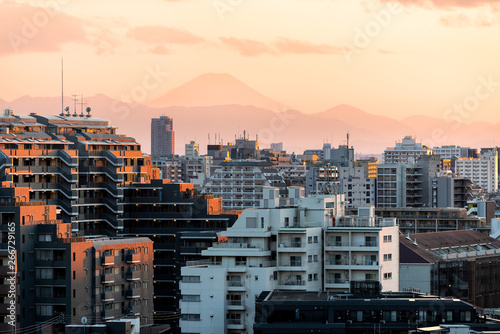 Photography Tokyo, Japan Shinjuku cityscape at sunset with silhouette view of Mount Fuji and