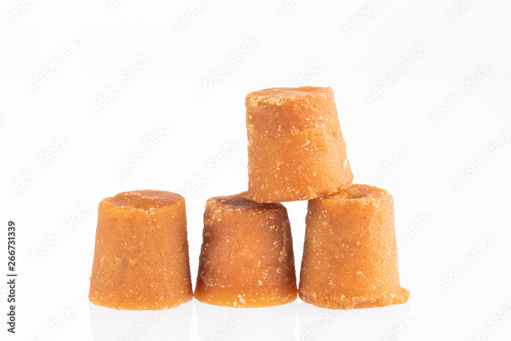 Panela or sugar cane candy - Saccharum officinarum. Text space Panela or sugar cane candy - Saccharum officinarum. Text space