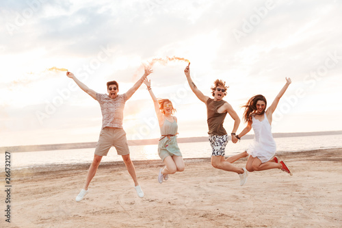Group of a cheerful young friends having fun