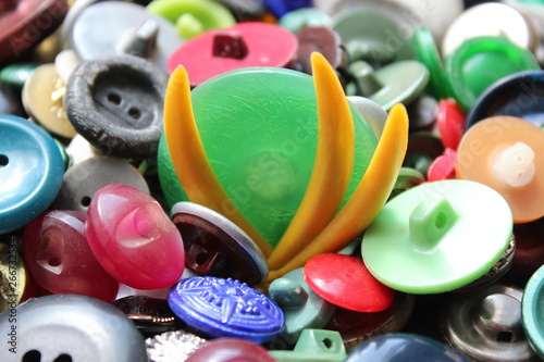A lot of multicolored different size old buttons