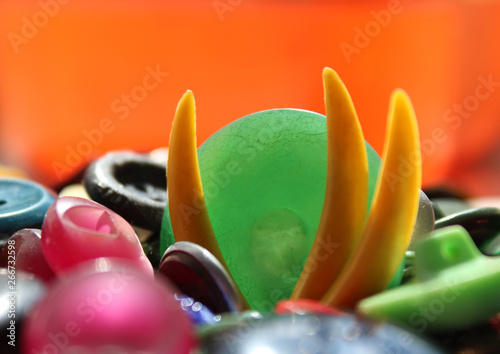 A lot of multicolored different size old buttons
