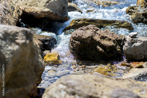 Sea coast with stones at the early morning 