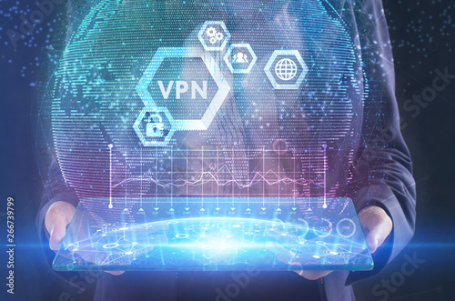 The concept of business, technology, the Internet and the network. A young entrepreneur working on a virtual screen of the future and sees the inscription: VPN © photon_photo