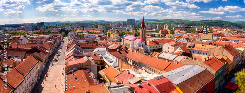 Panoramic view of Kosice Old city from St. Elisabeth Cathedral, scenic daytime cityscape with streets, red tiled roofs of medieval buildings and blue cloudy sky, urban skyline, Slovakia (Slovensko) photo
