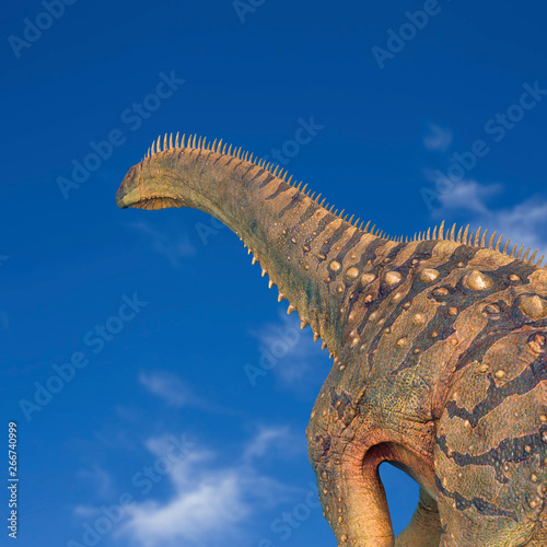 alamosaurus in a blue sky background