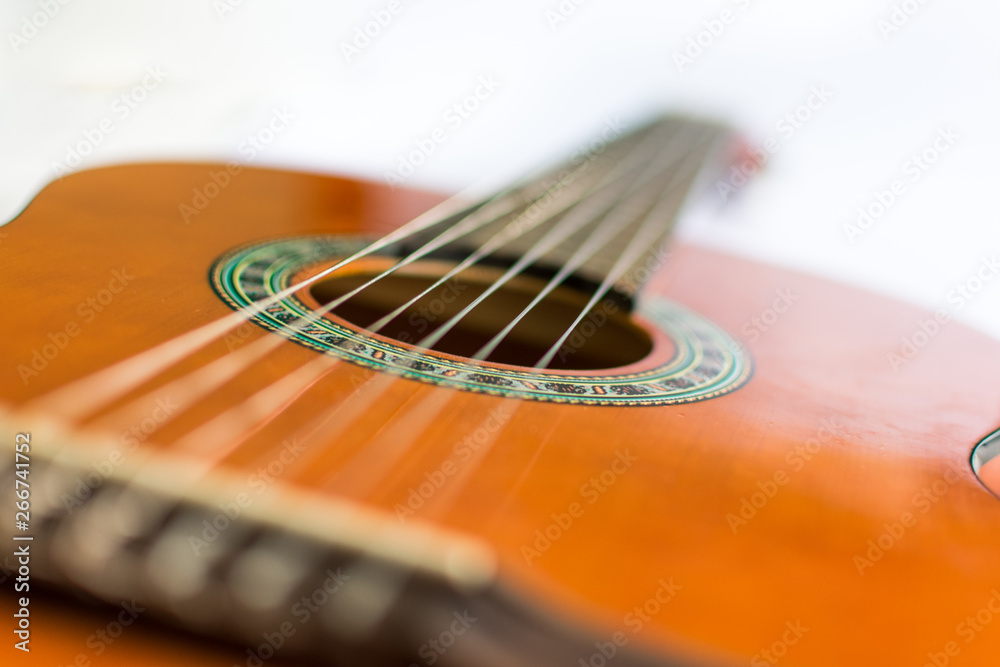Fototapeta premium Classic acoustic guitar on white background view.
