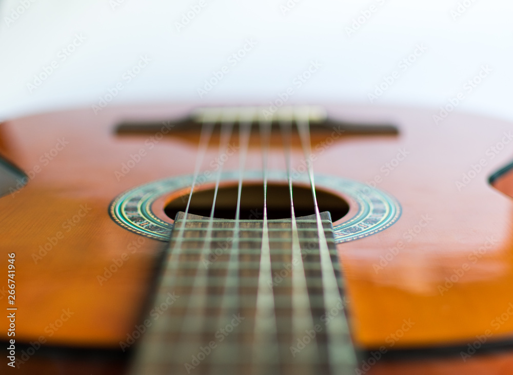 Fototapeta premium Classic acoustic guitar on white background view.