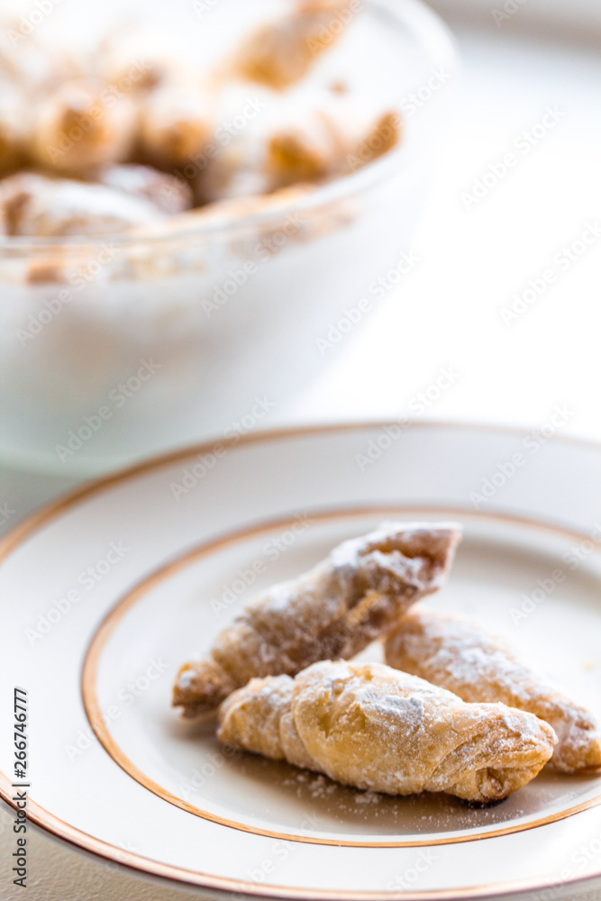 Cornulețe. A traditional Romania dessert that is a small croissant stuffed with jam or Turkish delight sprinkled with icing sugar Cornulețe. A traditional Romania dessert that is a small croissant stuffed with jam or Turkish delight sprinkled with icing sugar