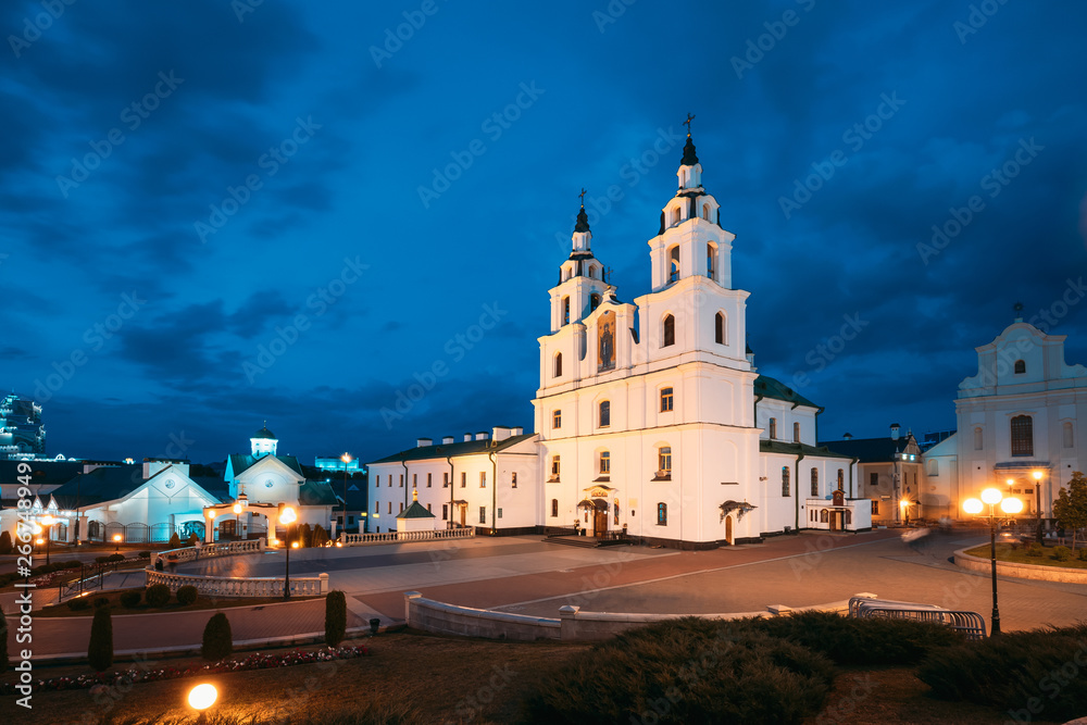 Minsk, Belarus. Illuminated Cathedral Of Holy Spirit In Minsk At Evening Or Night Street Lights . Famous Landmark. Main Orthodox Church Of Belarus At Evening.