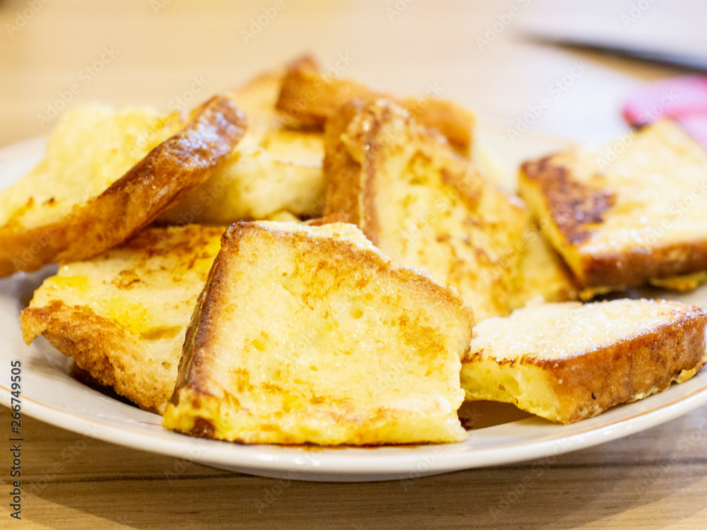 fried white bread is on a plate