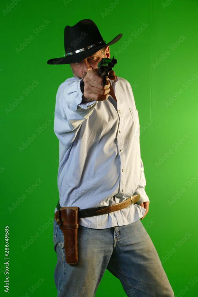 cowboy gunfighter black hat Colt revolver cowboy gunfighter black hat Colt revolver