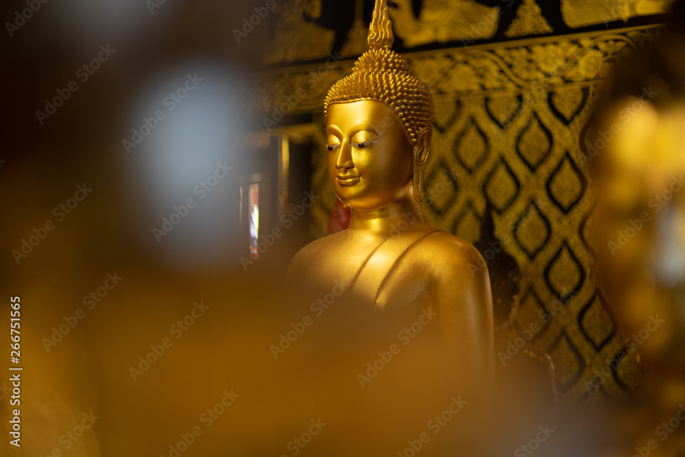 Golden buddish state in the art style at watbangpleeyainai temple ,Samutprakan ,Thailand Golden buddish state in the art style at watbangpleeyainai temple ,Samutprakan ,Thailand