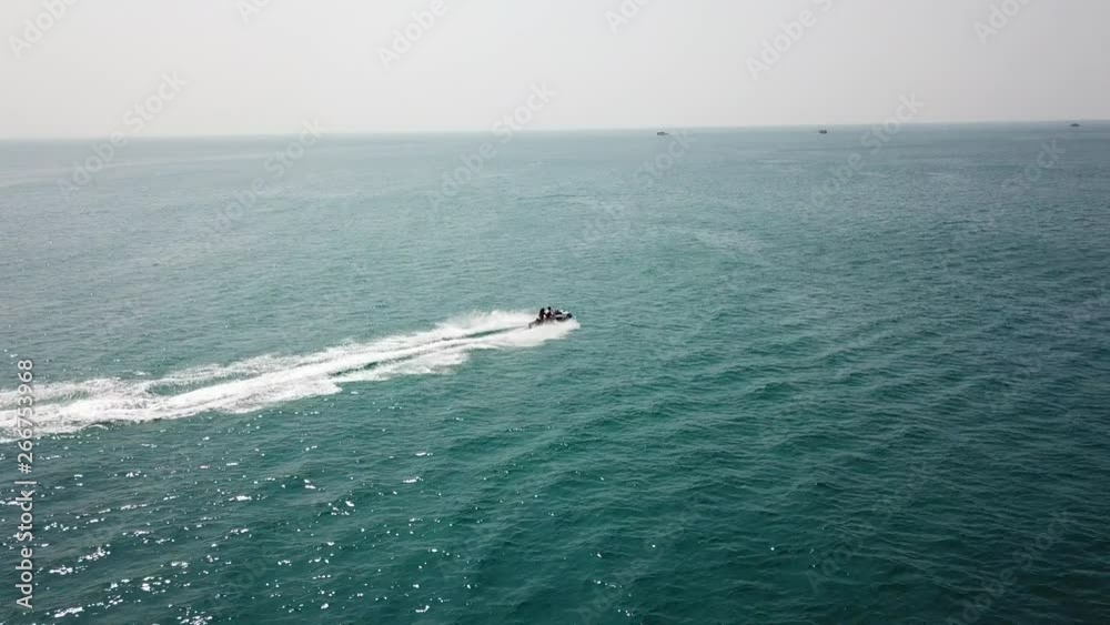 Men on water scooter in Sri Lanka