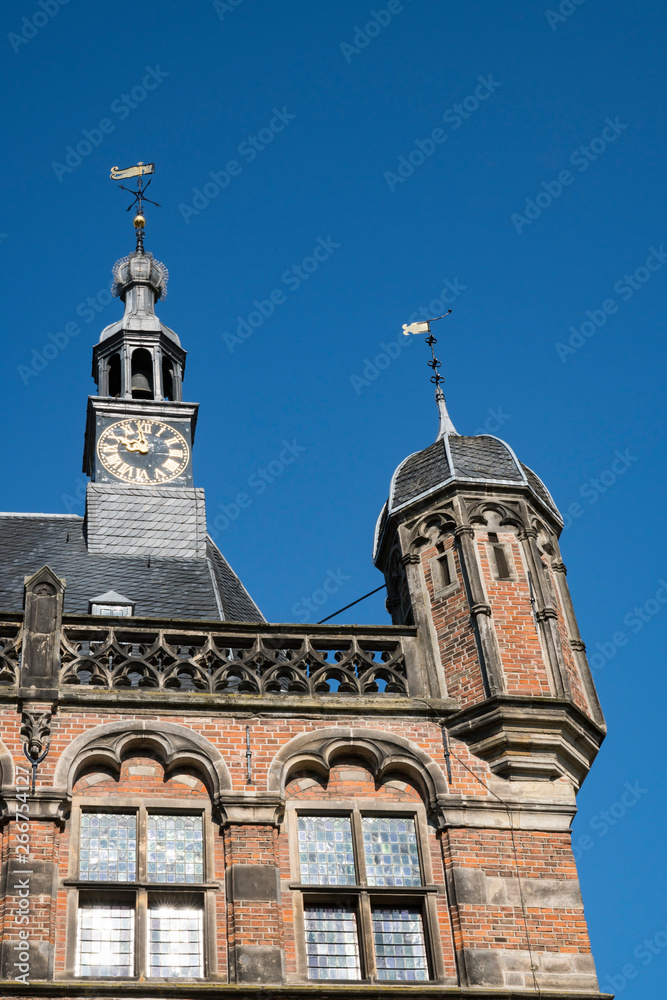 detail of building called De Waag, in Deventer, The Netherlands. Against blue sky