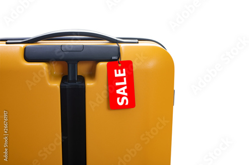 a suitcase with a label with the word SALE