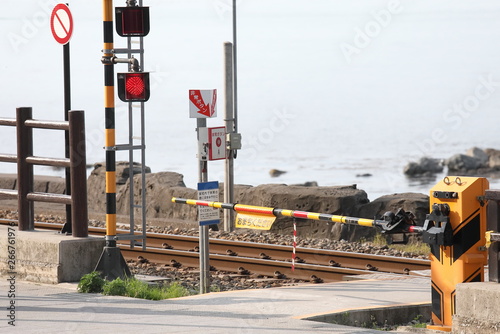 Train crossing in countryside Himi city Toyama Japan photo