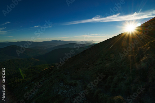 Sun above Ukrainian Carpathian Mountains, Chornohora, Carpathians © Sergiy