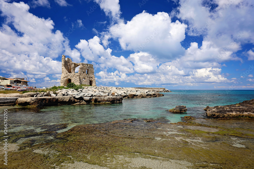 Fishing italian village Briatico in Calabria with turquoise sea and old saracen tower