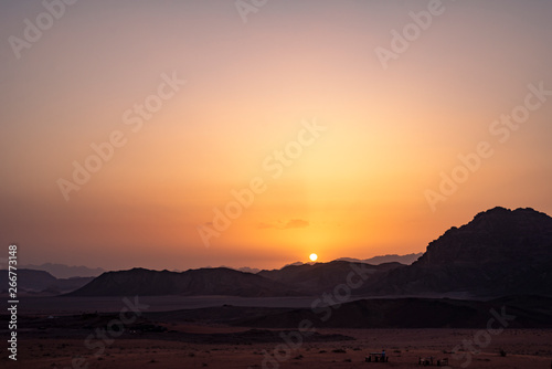 sunset and orange sky at desert