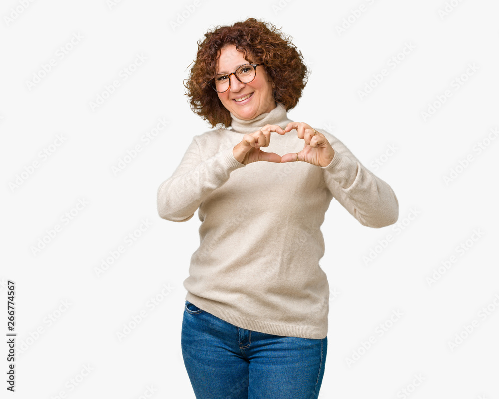 Beautiful middle ager senior woman wearing turtleneck sweater and glasses over isolated background smiling in love showing heart symbol and shape with hands. Romantic concept. Beautiful middle ager senior woman wearing turtleneck sweater and glasses over isolated background smiling in love showing heart symbol and shape with hands. Romantic concept.