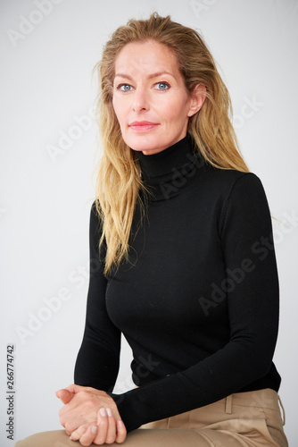 Beautiful middle aged woman isolated studio portrait