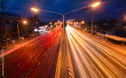 Speed Traffic - light trails on The city road to Town Phuket Thailand highway at night, long exposure abstract background