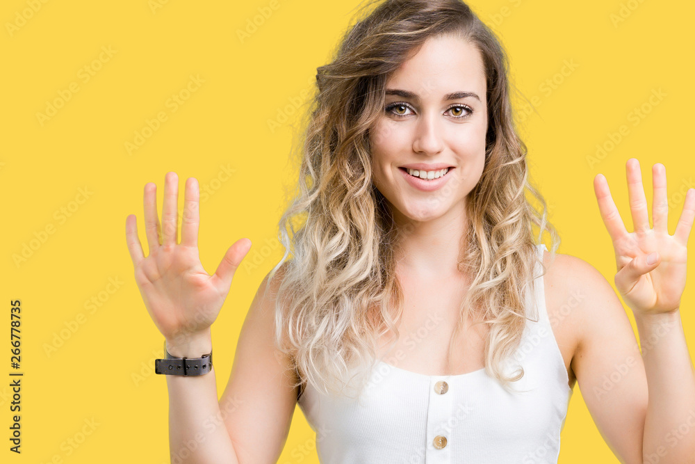 Young beautiful blonde woman over isolated background showing and pointing up with fingers number nine while smiling confident and happy. Young beautiful blonde woman over isolated background showing and pointing up with fingers number nine while smiling confident and happy.