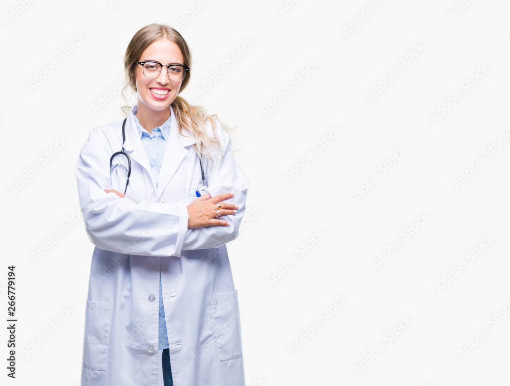 Beautiful young blonde doctor woman wearing medical uniform over isolated background happy face smiling with crossed arms looking at the camera. Positive person.