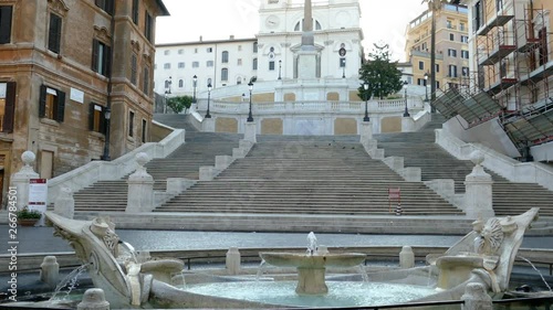 Spanish Steps and fountain in Piazza Spagna at morning time