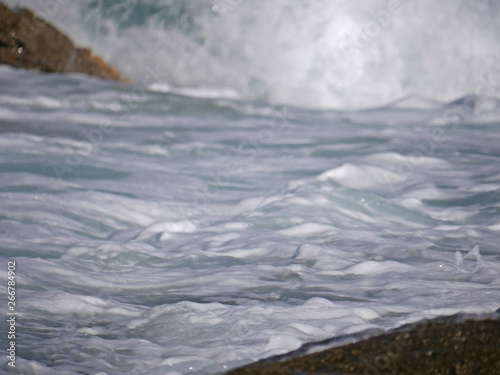 Waves crashing against the rock