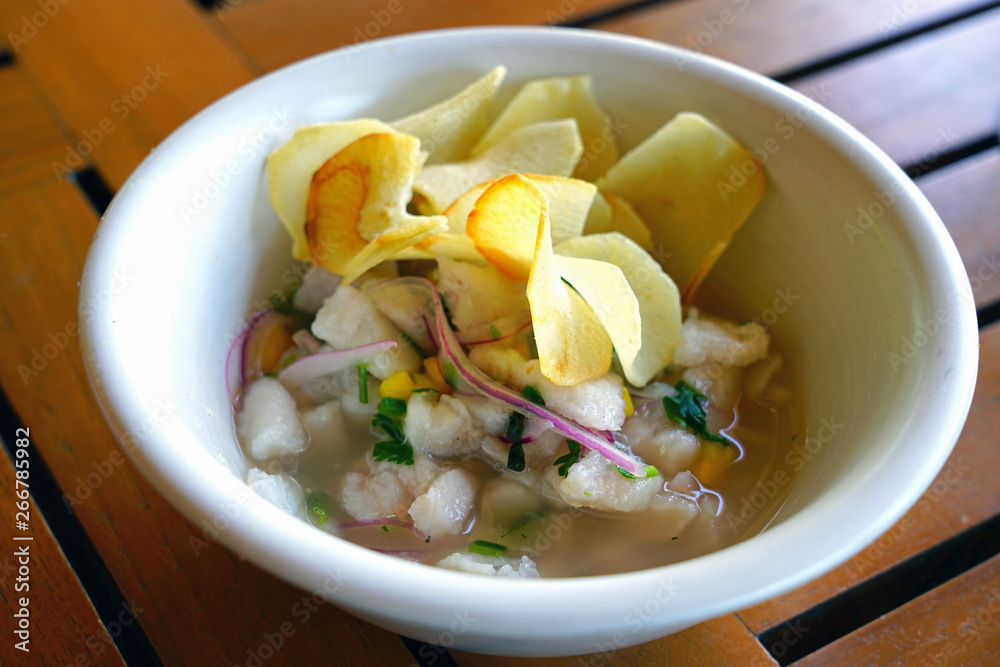 Raw fish ceviche with plantain chips Raw fish ceviche with plantain chips