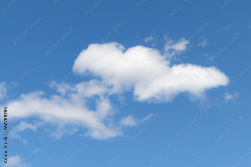 Colorful volumetric clouds on a bright sky Colorful volumetric clouds on a bright sky