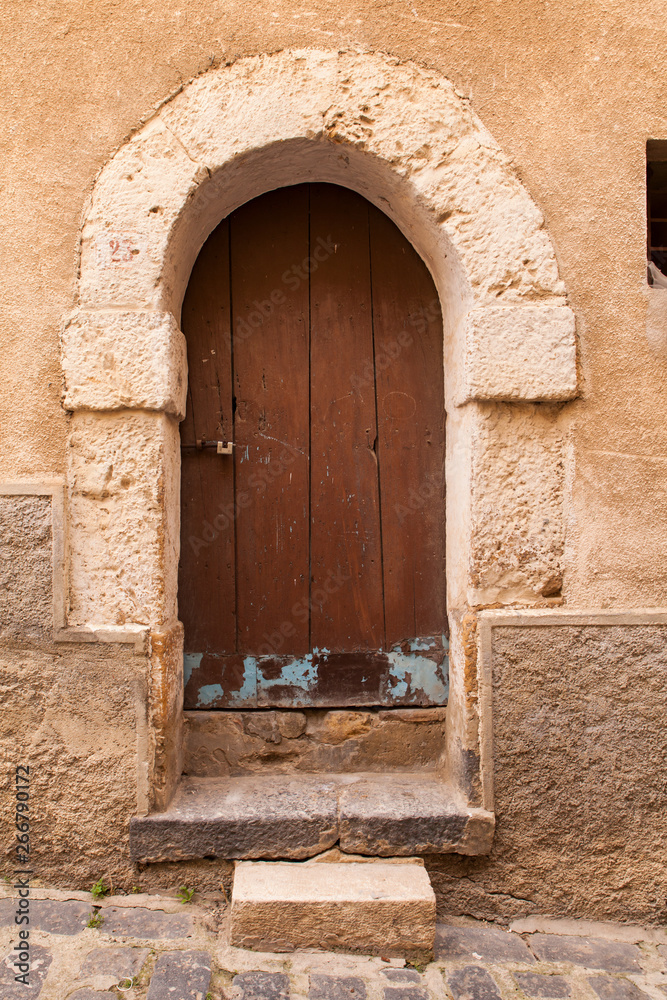 Old wooden door in Piazza Armerina