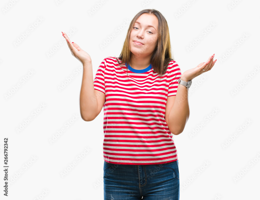 Young caucasian beautiful woman over isolated background clueless and confused expression with arms and hands raised. Doubt concept. Young caucasian beautiful woman over isolated background clueless and confused expression with arms and hands raised. Doubt concept.