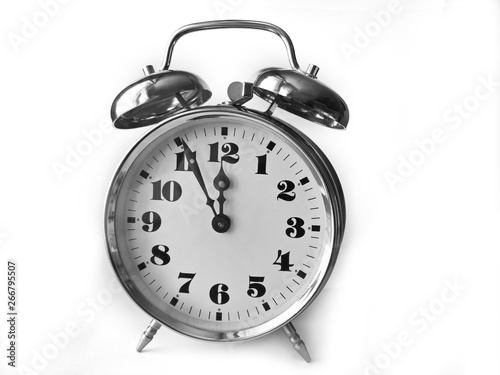 Five to twelve on alarm clock. Deadline concept