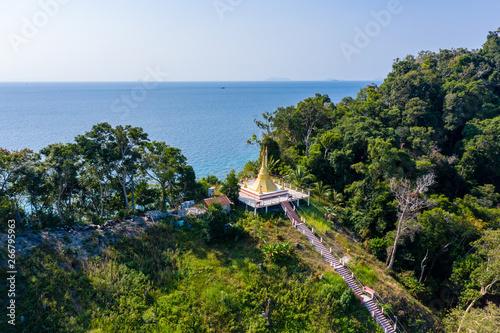 Aerial drone view of a small Buddhist Pagoda on a small tropical island in Myanmar (Swinton Island) photo