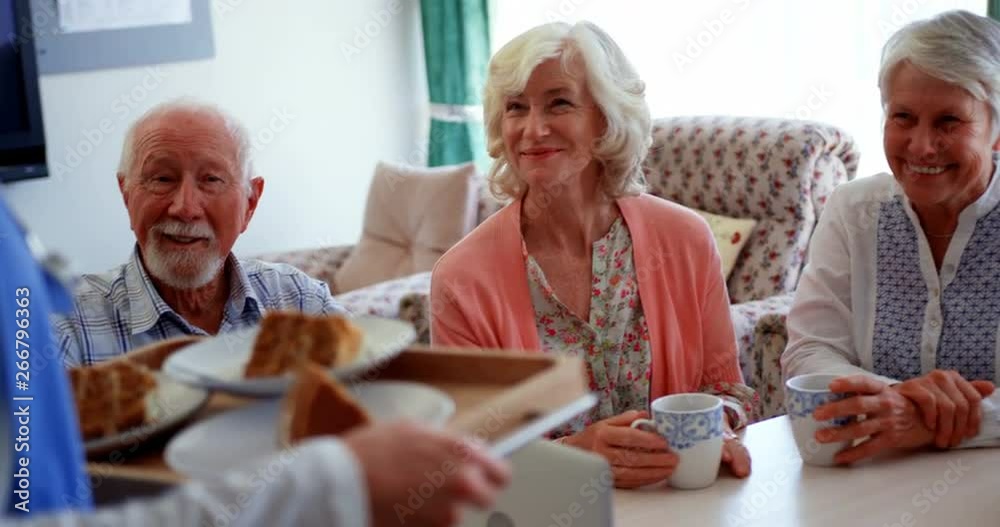 Active Caucasian senior people smiling on dining table at nursing home 4k