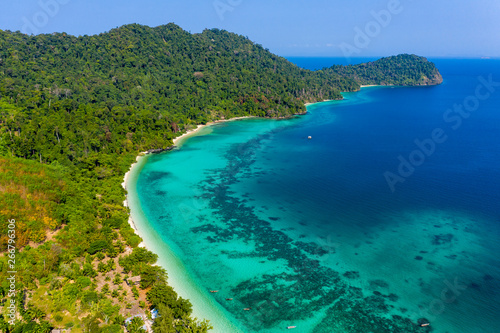 Aerial drone view of a beautiful tropical island surrounded by coral reef (Greater Swinton Island, Myanmar)
