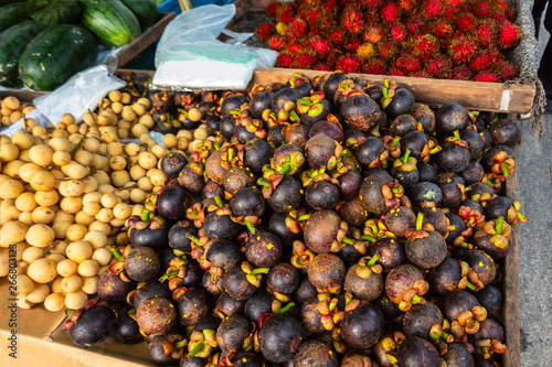 Open air fruit market in the village in Thailand photo