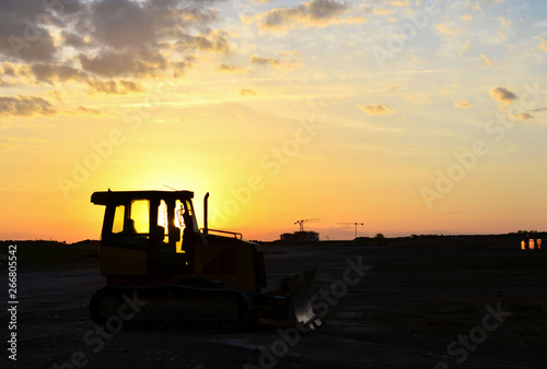 Track-Type Tractors, Bulldozer, Earth-Moving Heavy Equipment for Construction - Image © MaxSafaniuk