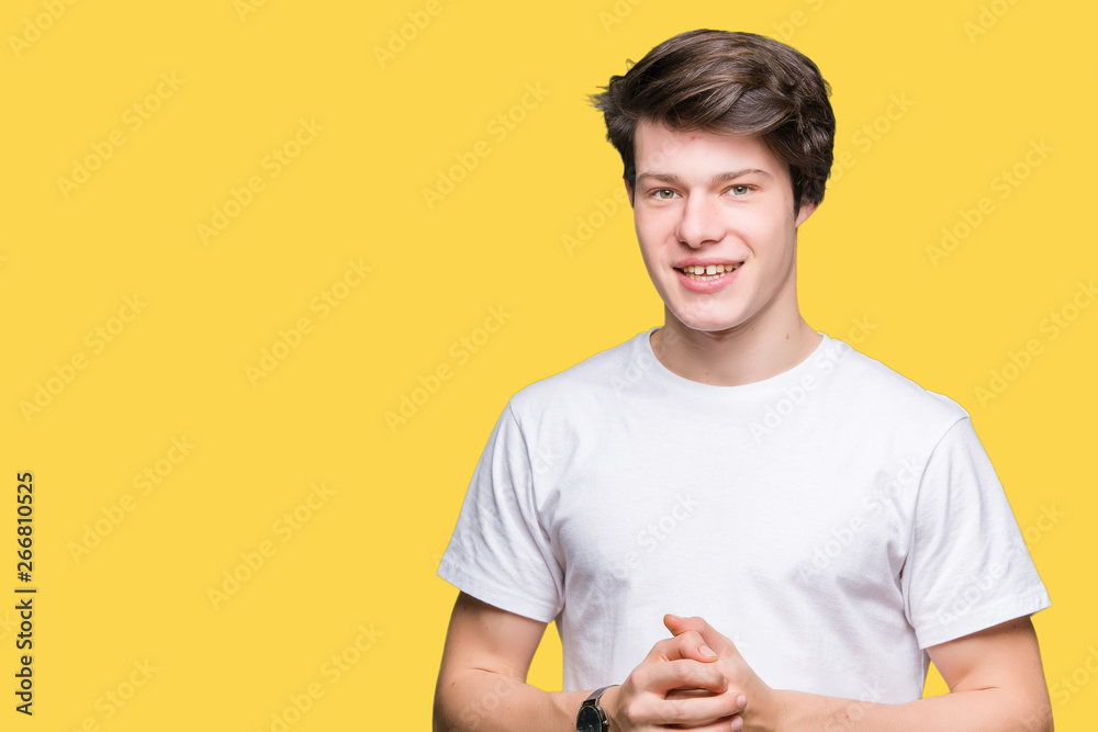 Young handsome man wearing casual white t-shirt over isolated background Hands together and fingers crossed smiling relaxed and cheerful. Success and optimistic Young handsome man wearing casual white t-shirt over isolated background Hands together and fingers crossed smiling relaxed and cheerful. Success and optimistic