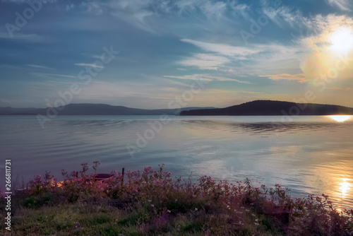 Fototapeta Naklejka Na Ścianę i Meble -  Summer landscape on the shore of a mountain lake