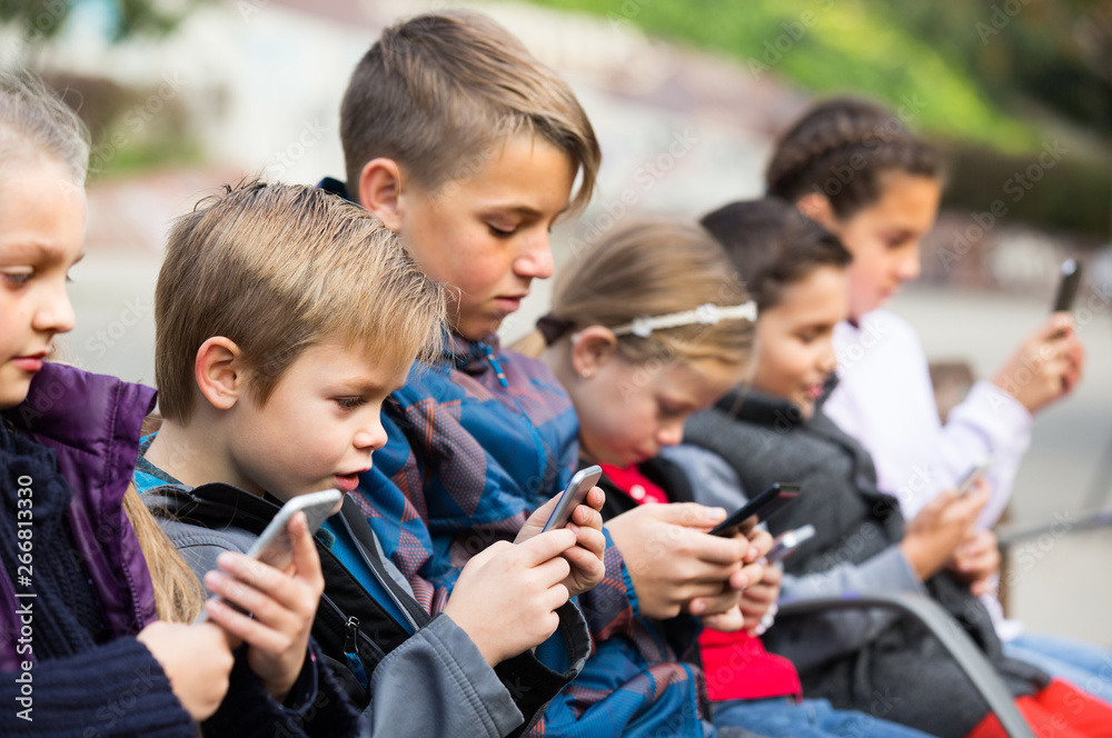 Fototapeta premium children with mobile devices