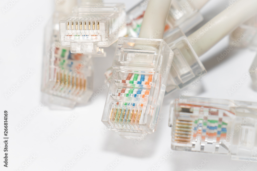 Close-up of many rj-45 connectors on isolated white background Close-up of many rj-45 connectors on isolated white background